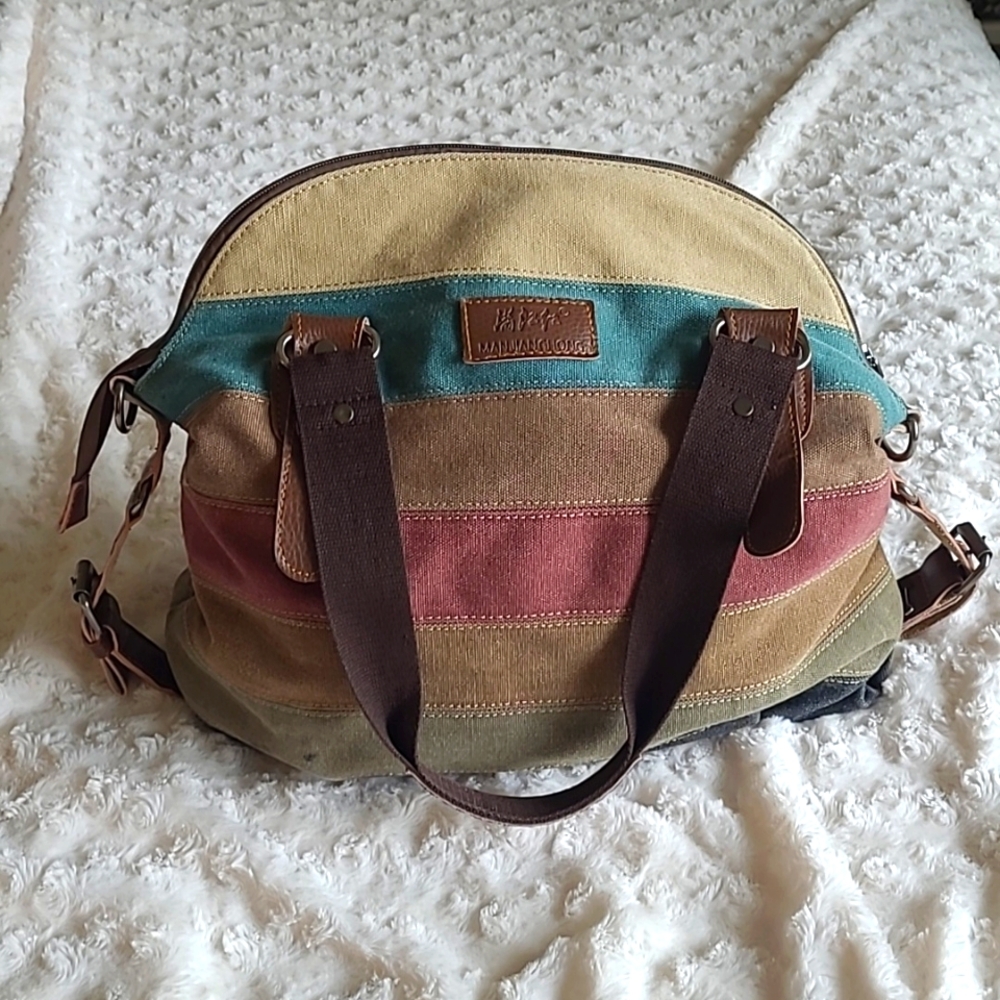 Manjianghong boho style earth tone canvas bag with zipper.